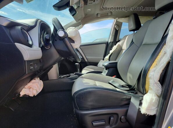 2T3YFREVXGW235392 2016 TOYOTA RAV4 Серебряный Вид салона спереди