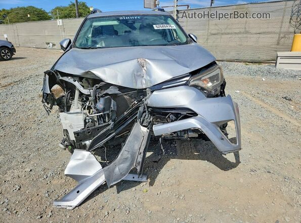 2T3YFREVXGW235392 2016 TOYOTA RAV4 Серебряный Вид спереди