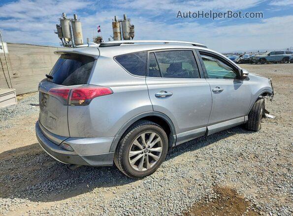 2T3YFREVXGW235392 2016 TOYOTA RAV4 Серебряный Задняя правая четверть