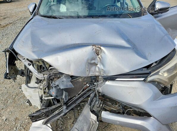 2T3YFREVXGW235392 2016 TOYOTA RAV4 Серебряный Вид задней части салона