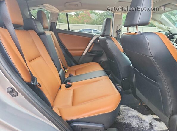 2T3YFREVXGW278985 2016 TOYOTA RAV4 Silver Rear interior view