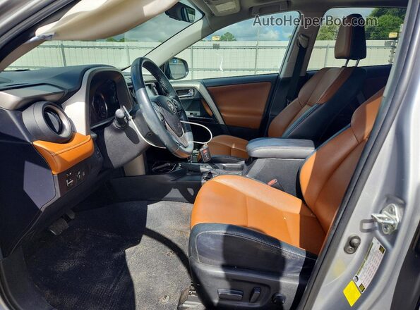 2T3YFREVXGW278985 2016 TOYOTA RAV4 Silver Front interior view