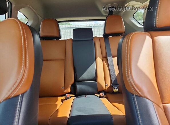 2T3YFREVXGW278985 2016 TOYOTA RAV4 Silver Rear seats view