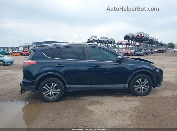 2T3ZFREV0HW334762 2017 TOYOTA RAV4 Dark Blue Vista interior trasera