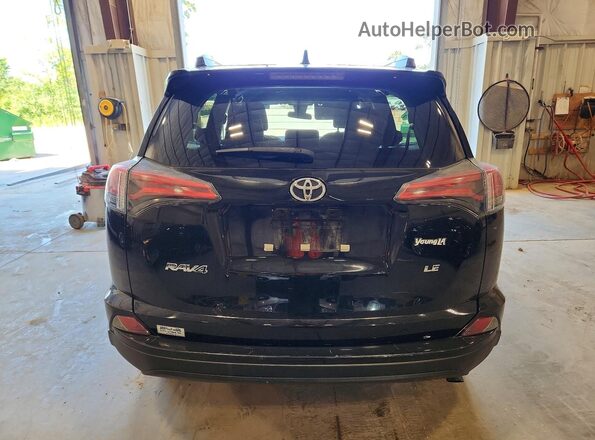 2T3ZFREV0HW336611 2017 TOYOTA RAV4 Черный Вид сзади