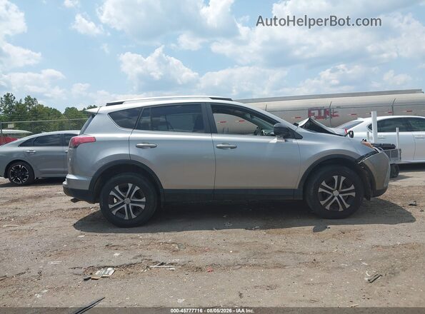 2T3ZFREV0HW372976 2017 TOYOTA RAV4 Silver Սալոնի հետևի տեսք