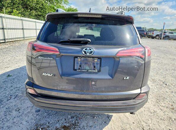 2T3ZFREV0JW452137 2018 TOYOTA RAV4 Gray Rear view