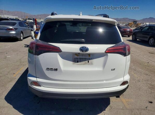 2T3ZFREV1JW510546 2018 TOYOTA RAV4 Белый Вид сзади
