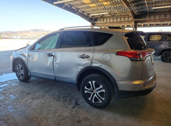 2T3ZFREV2GW291959 2016 TOYOTA RAV4 Серебряный Задняя левая четверть