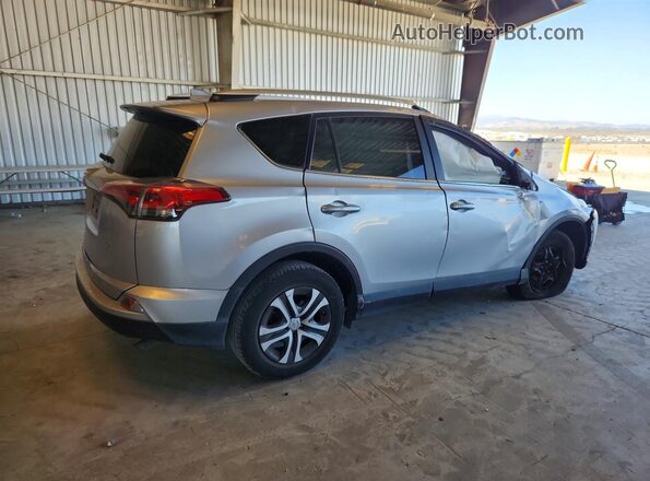 2T3ZFREV2GW291959 2016 TOYOTA RAV4 Серебряный Задняя правая четверть