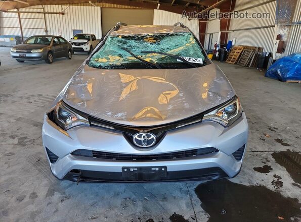 2T3ZFREV2GW291959 2016 TOYOTA RAV4 Серебряный Вид спереди