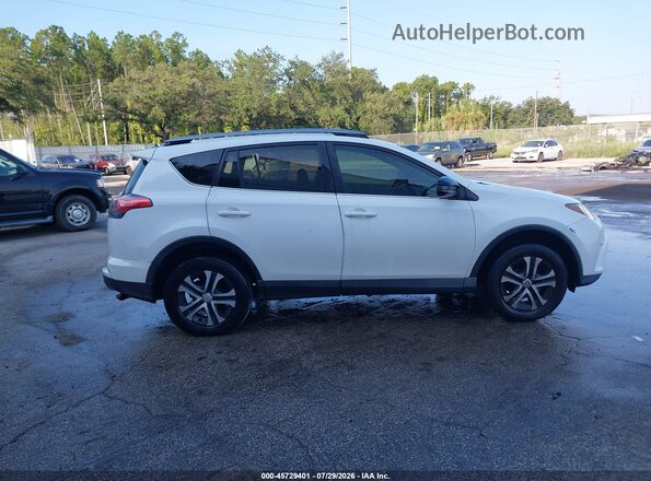 2T3ZFREV2HW315081 2017 TOYOTA RAV4 White Սալոնի հետևի տեսք