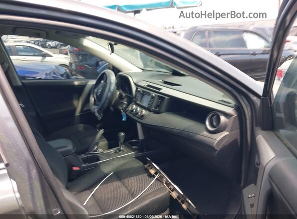 2T3ZFREV2HW346282 2017 TOYOTA RAV4 Black წინა სალონის ხედი
