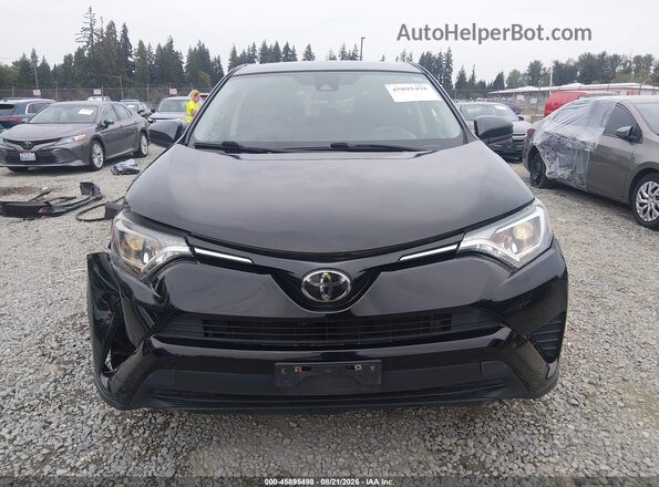2T3ZFREV2JW480909 2018 TOYOTA RAV4 Black Widok wnętrza z tyłu