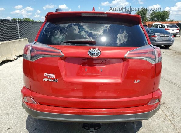 2T3ZFREV3GW287709 2016 TOYOTA RAV4 Red Vista trasera