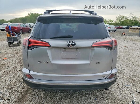 2T3ZFREV3GW303889 2016 TOYOTA RAV4 Silver უკანა ხედი