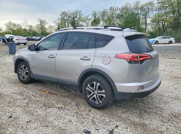 2T3ZFREV3GW303889 2016 TOYOTA RAV4 Silver უკანა მარცხენა