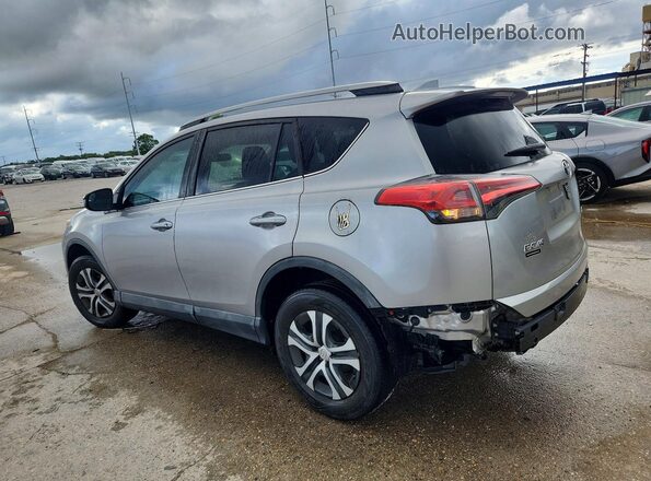 2T3ZFREV3HW335811 2017 TOYOTA RAV4 Gray Rear left