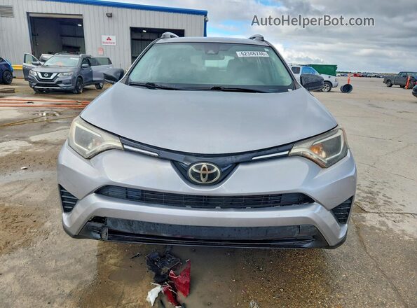 2T3ZFREV3HW335811 2017 TOYOTA RAV4 Gray Front view