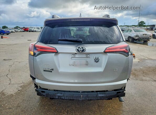 2T3ZFREV3HW335811 2017 TOYOTA RAV4 Gray Rear view