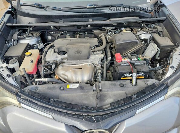 2T3ZFREV3HW335811 2017 TOYOTA RAV4 Gray Rear interior view