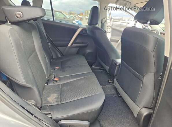 2T3ZFREV3HW335811 2017 TOYOTA RAV4 Gray Rear seats view