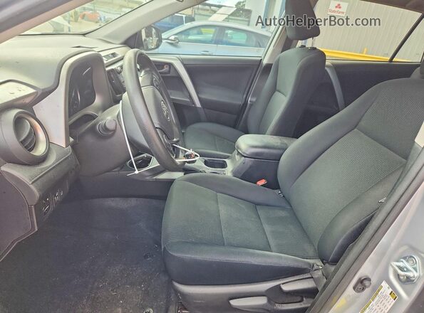 2T3ZFREV3HW335811 2017 TOYOTA RAV4 Gray Front interior view