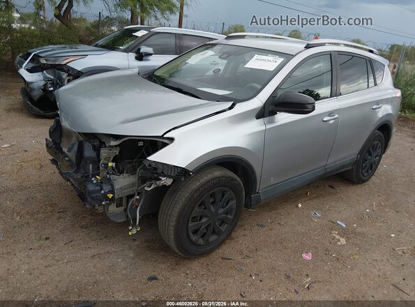 2T3ZFREV3JW416880 2018 TOYOTA RAV4 Silver წინა მარცხენა ხედი სამი მეოთხედიდან