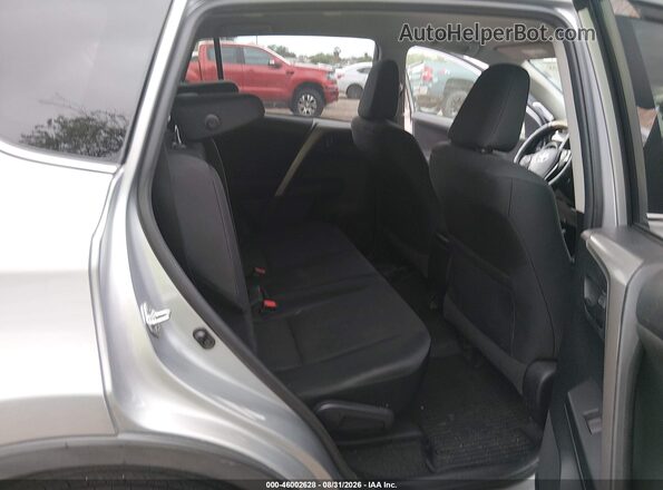 2T3ZFREV3JW416880 2018 TOYOTA RAV4 Silver VIN კოდის სტიკერის ხედი