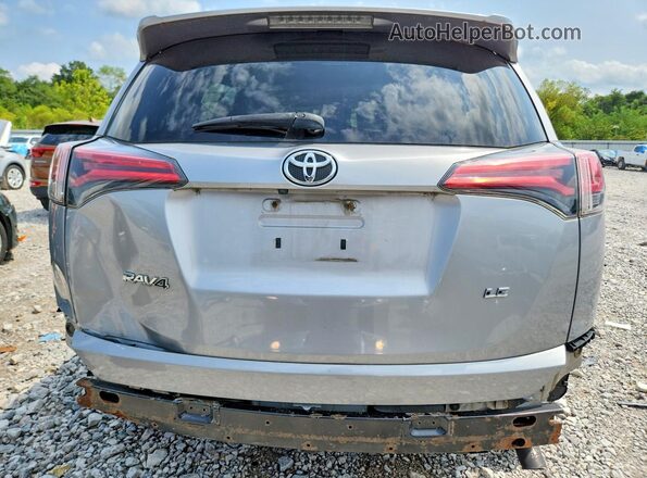 2T3ZFREV3JW426194 2018 TOYOTA RAV4 Серебряный Вид сзади