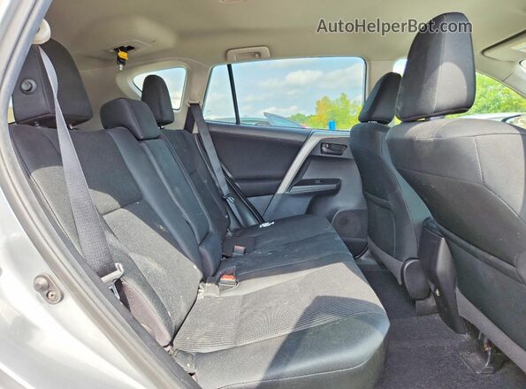 2T3ZFREV3JW426194 2018 TOYOTA RAV4 Серебряный Вид задней части салона