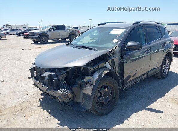 2T3ZFREV3JW456778 2018 TOYOTA RAV4 Gray Առջևի ձախ երեք քառորդ տեսարան
