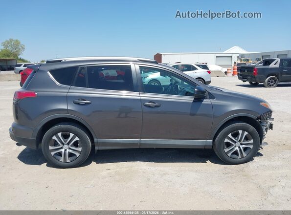 2T3ZFREV3JW456778 2018 TOYOTA RAV4 Gray Սալոնի հետևի տեսք