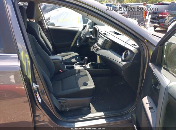 2T3ZFREV4GW282132 2016 TOYOTA RAV4 Gray Widok wnętrza z przodu