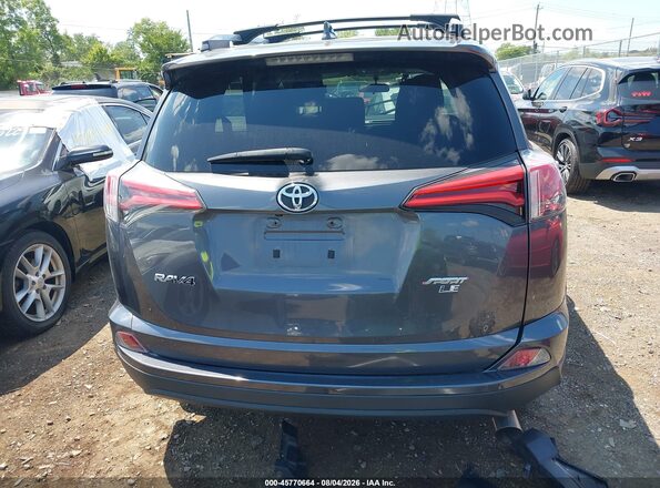 2T3ZFREV4GW282132 2016 TOYOTA RAV4 Gray 