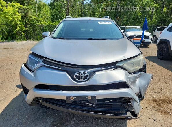 2T3ZFREV4GW306672 2016 TOYOTA RAV4 Silver Widok z przodu