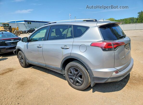 2T3ZFREV4GW306672 2016 TOYOTA RAV4 Silver Tył lewy