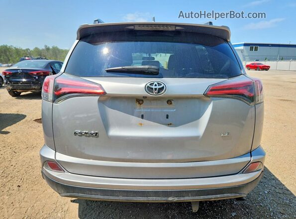 2T3ZFREV4GW306672 2016 TOYOTA RAV4 Silver Widok z tyłu