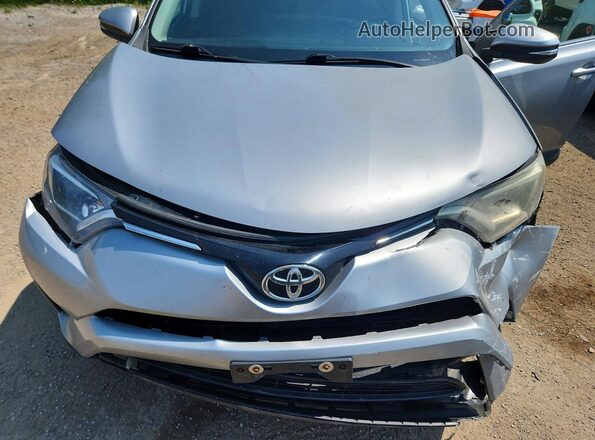 2T3ZFREV4GW306672 2016 TOYOTA RAV4 Silver Widok komory silnika