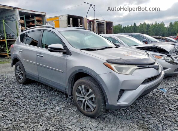 2T3ZFREV4HW324719 2017 TOYOTA RAV4 Silver Front right
