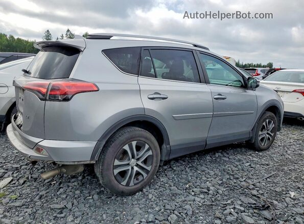 2T3ZFREV4HW324719 2017 TOYOTA RAV4 Silver Rear right