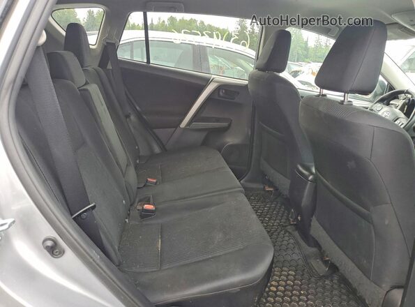 2T3ZFREV4HW324719 2017 TOYOTA RAV4 Silver Rear interior view