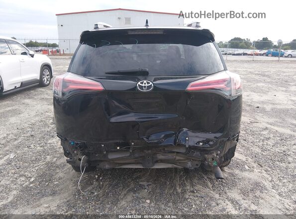 2T3ZFREV4HW382765 2017 TOYOTA RAV4 Black Front view