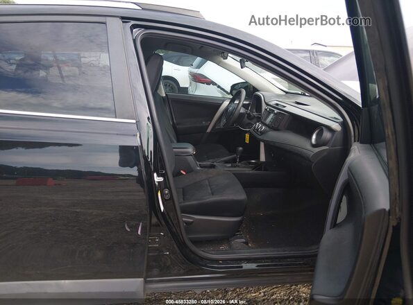 2T3ZFREV4HW382765 2017 TOYOTA RAV4 Black Front interior view