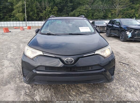 2T3ZFREV4HW382765 2017 TOYOTA RAV4 Black Rear interior view