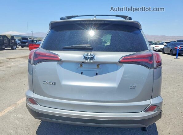 2T3ZFREV4JW471208 2018 TOYOTA RAV4 Silver Հետևի տեսք