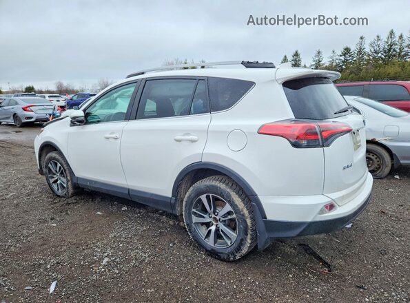 2T3ZFREV4JW481365 2018 TOYOTA RAV4 White Rear left