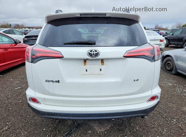 2T3ZFREV4JW481365 2018 TOYOTA RAV4 White Rear view