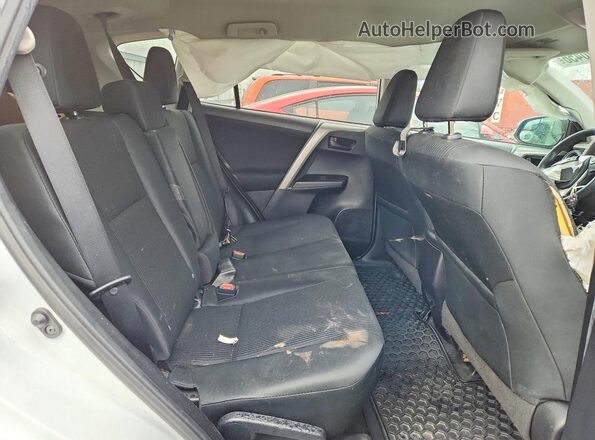 2T3ZFREV4JW481365 2018 TOYOTA RAV4 White Rear interior view