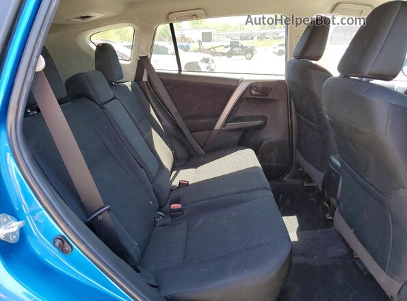 2T3ZFREV4JW508872 2018 TOYOTA RAV4 Blue Rear interior view